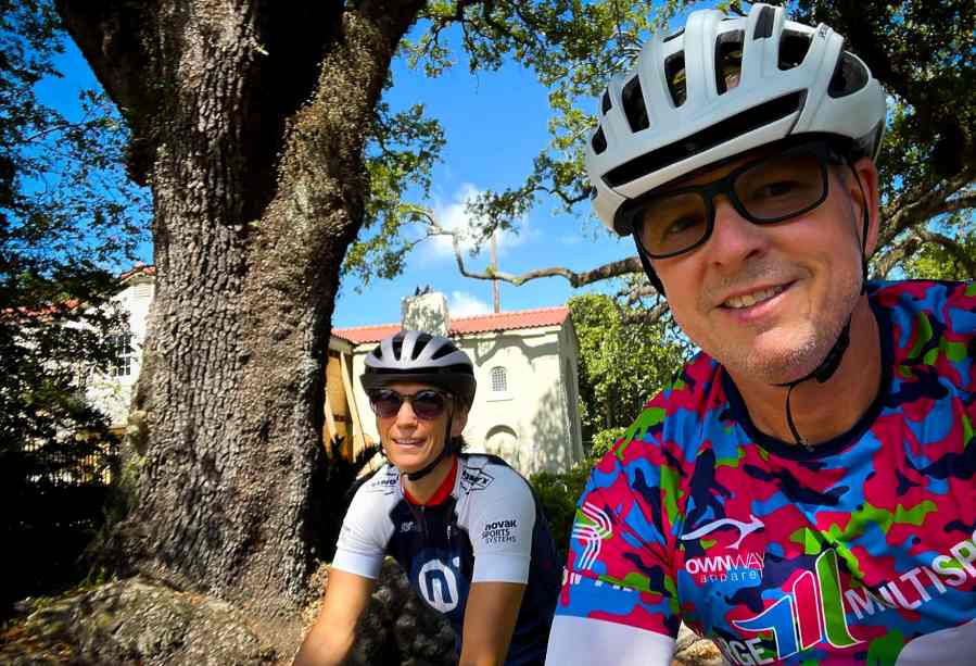 Angie and Will riding bikes in Audubon Park New Orleans